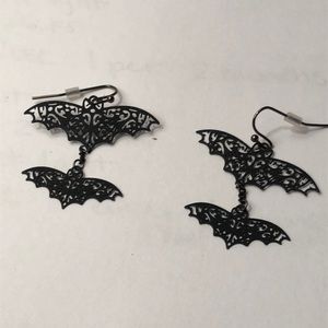 Cutout black bat earrings